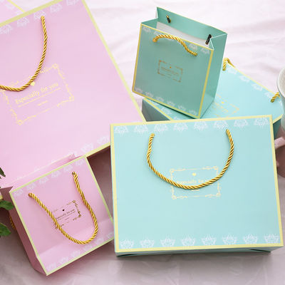 Elegantes bolsas de papel decorativo, papel de revestimiento UV bolsas de comestibles con asas