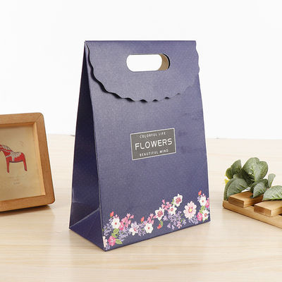 Spot UV / Estampado en caliente Bolsas de compras de papel de venta al por menor Caramelos Bolsa de regalo dulce para niños