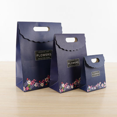 Spot UV / Estampado en caliente Bolsas de compras de papel de venta al por menor Caramelos Bolsa de regalo dulce para niños