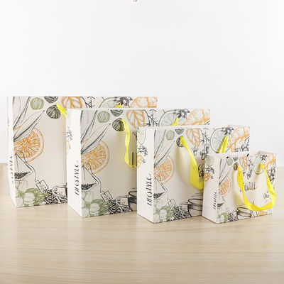 Bolsas de compras de papel de venta al por menor con estilo Impresas únicas para embalaje de regalos