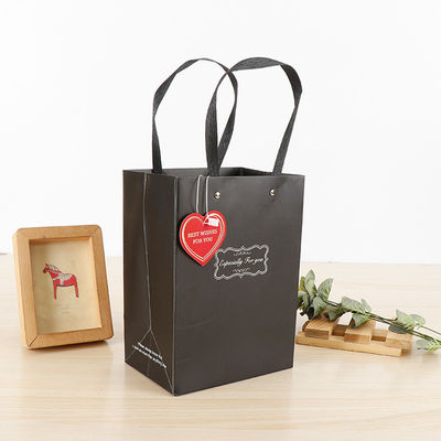 Bolsas de compras de papel de gran capacidad de venta al por menor Bolsas de mano Matt Laminado Superficie de acabado