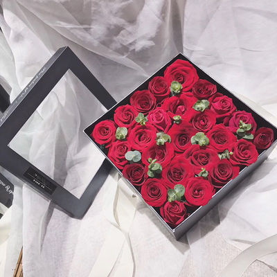 Caja de regalo de papel rígido de color rosa real con cinta redonda y cuadrada
